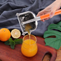 Miniatyrbillede 2 af 4: Frugtsaftpresser i rustfrit stål - Robust manuel frugtsaftpresser med 2 X