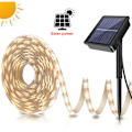 Pikkukuva 1 / 5: Thsinde ulkoinen aurinkokennoinen LED-nauha, 5M 150LED aurinkokennoinen LED-nauha, vedenpitävä ulkoinen aurinkokennovalonauha, kodin puutarhan esittelyyn häihin jouluun - lämmin