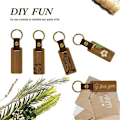 Miniatyrbild 5 av 5: 20-pack rektangulära tränyckelringar i läder med tomma valnötsnyckelringar med nyckelringar för DIY-graveringspresent