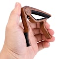 Miniatyrbild 3 av 5: 2 st Aluminiumlegering Elektrisk Gitarr Capo Träkorn Capo + 5 st Gitarrplock (Med Spår)