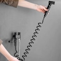 Miniatyrbild 5 av 5: 1-i-2-ut Dubbelstyrningsventil Mini Multifunktionskran Mini Duschtryck Badrumsset för Bidet och Dusch-C