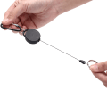 Miniatyrbillede 2 af 5: Sort tilbagetrækkelig nøglering Reel Stålsnor Recoil Bælte Key Rin Black One Size