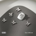 Pikkukuva 1 / 8: 10 kpl DIY Nail Art Decoration 3D hopea perhonen kiiltävä rhinest F 10Pcs