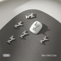 Pikkukuva 1 / 8: 10 kpl DIY Nail Art Decoration 3D hopea perhonen kiiltävä rhinest H 10Pcs