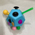 Miniatyrbillede 2 af 6: Anti-Stress Cube Legetøj til Angstlindring - Depressionslindrende Fidget Cube B4 black orange blue