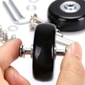 Miniatyrbilde 4 av 5: 4-pakning med utskiftbare svingbare gummihjul for kofferter, 45 x 18 mm