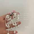 Pikkukuva 5 / 5: Kukkahelmi Tofs Dingla korvakorut, Bohemian With Pearl Tofs