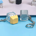 Miniatyrbilde 4 av 8: Merit +1 Muyu Dekompresjonsnøkkelring Tangentbordknapp Fingertupp Gul one size Yellow one size