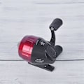 Miniatyrbillede 4 af 5: Matchende Shot Fish Fiske Rulle Til Udendørs Jagt Fiske Hjul Lukket Harpun Rulle Rød  Sort