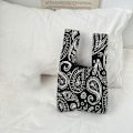 Miniatyrbild 9 av 10: Stickad handväska Knot handledsväska SVART STYLE3 STYLE3 black style3-style3
