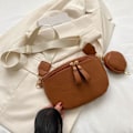 Pikkukuva 9 / 10: Rintalaukku kainalotasku RUSKEA Brown