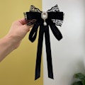 Pikkukuva 1 / 9: Rusetti pitsiset Bowknot-rintakorut C C C