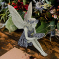 Miniatyrbilde 3 av 4: Hagefe-statue, solsikkefe-statue, hageskulptur, fuglemater, hagepynt