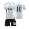 Miniatyrbillede 1 af 2: 23/24 Ajax udebanebørnefodboldsæt 10 TADIC barnstorlekar24