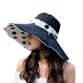 Miniatyrbild 1 av 3: Kvinnors bredbrättade solhatt hopfällbar floppy hatt vändbar sommarstrand rullhatt solhatt hopfällbar UV-skydd(svart)