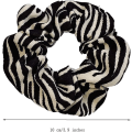 Pikkukuva 2 / 5: Leopardikuvioiset hiusdonitsit, eläinkuvioiset donitsit, 3 kpl poninhäntäpidikkeitä Black Zebra