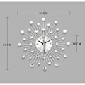 Pikkukuva 3 / 8: 79/3165 Metalliseinäkello, kristallitähti, hopea