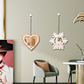 Miniatyrbild 3 av 5: Trädekorationer, Julgransprydnader för en glädjefull säsong, Tillverkade av naturligt trämaterial, Urholkad design ger en konstnärlig touch till