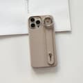 Fodral för iPhone 16e aprikos Pebbled handledsringstativ