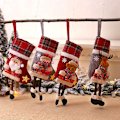 Miniatyrbild 1 av 5: 4 stycken julstrumpor i medelstor rutig design med julgranshänge för barn