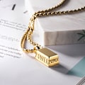 Miniatyrbillede 3 af 5: Guld rektangulært stykke antik titanium stål vedhæng halskæde
