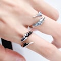 Miniatyrbillede 1 af 5: 1 par justerbare sorte og blå slange ringe til par