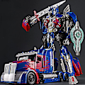 Pikkukuva 6 / 6: Muuttuva lelu Optimus Prime -lelu, muotoiltu auto robotti, toimintahahmon muodonmuutosmalli, muuntava seos