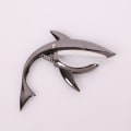 Miniatyrbilde 3 av 5: Gitar klips i sinklegering, hai-formet gitarramme, for akustisk gitar