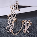 Miniatyrbilde 4 av 5: Dame Ring Dobbel Full Finger Rose Ett stykke Punk Sparkling Knuckle Armor Ring For Cosplay White