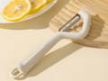 Miniatyrbillede 7 af 10: Grøntsagsskræller med dobbeltblad, ergonomisk håndtag, rustfrit stål, beige