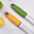 Miniatyrbillede 5 af 5: HK Citrus Zester Ost Rivjern Rustfrit Stål Citrus Zester Rivjern med Håndtag Citron Zester til black
