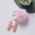 Miniatyrbillede 1 af 8: e Nøglering Rosa Pompom Kugle Nøglering med 26 bogstaver Resin Nøgleringe H