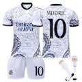Miniatyrbild 1 av 2: 23-24 Real Madrid Dragon Vit Special Edition Fotbollströjor Barn Fotbollsset No.10 Modric[qb] No.10 Modric M