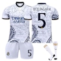 Miniatyrbild 1 av 2: 23-24 Real Madrid Dragon Vit Special Edition Fotbollströjor Barn Fotbollskit No.5 Bellingham[qb] No.5 Bellingham L