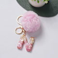 Miniatyrbillede 1 af 8: e Nøglering Rosa Pompom Kugle Nøglering med 26 bogstaver Resin Nøgleringe N