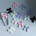 Pikkukuva 4 / 5: 30 kpl Hartsi Rosetti Kynsikorut 3D Rosetti Koristeet Charms Korut DIY UV Geeli Design Söpöt Manikyyri Tarvikkeet