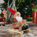Miniatyrbillede 5 af 10: Siddende slæde julemands juledukkefigurer 1 1 1