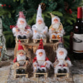 Miniatyrbillede 4 af 10: Siddende slæde julemands juledukkefigurer 2 2 2
