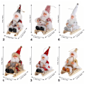 Miniatyrbilde 2 av 10: Sittende slede julenisse juledukkefigurer 4 4 4