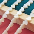 Miniatyrbilde 4 av 4: 2 tråder ca 125 stk hjerteformede perler Naturlige skallperler