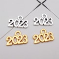 Miniatyrbillede 10 af 10: 100 stk. Souvenirvedhæng 2023 kvast STYLE-3 STYLE-3 Style-3