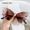 Miniatyrbild 1 av 10: Crystal Butterfly Solglasögon Båglösa solglasögon GRADIENT TEA Gradient Tea