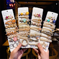Miniatyrbild 4 av 7: Diverse Hårklämmor Set Pearl Headpiece SET 8 SET 8