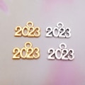 Pikkukuva 4 / 10: 100 kpl matkamuistoriipus 2023 tupsu STYLE-2 STYLE-2 Style-2
