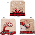Pikkukuva 3 / 3: Ruokapöydän tuolinpäälliset, 2 kpl, \"Merry Christmas\" -kirjoituksella