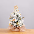 Miniatyrbilde 2 av 5: Miniatyr kunstig juletre med gullfarget snø