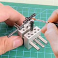 Miniatyrbillede 2 af 5: DIY Håndværk Multifunktionel Jig Justerbar Skruestik Jig til Modelbygning og Bænk Modelbygning Hobby Værktøj