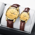 Miniatyrbilde 1 av 2: Quartz klokke fritid vind kalender dekorasjon lysende gold shell, gold face brown