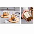 Miniatyrbilde 4 av 5: Gullspeil Reflekskopp og Treunderkopp Kaffekopp (Elg) B