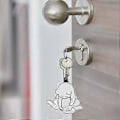 Miniatyrbillede 5 af 5: Sjov Vrikkende Kat Nøglering, 3D Roterende Kattebolde Fidget Legetøjs Nøglering white